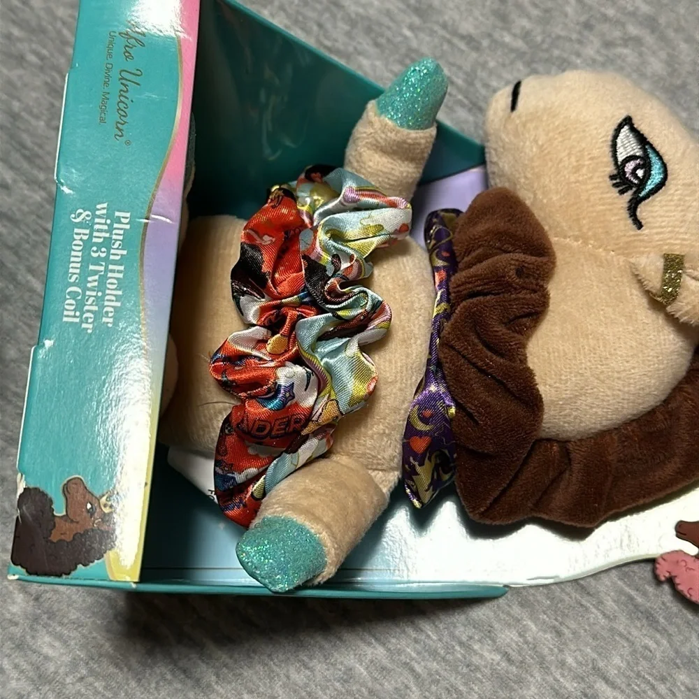 Afro unicorn toy and scrunchie set